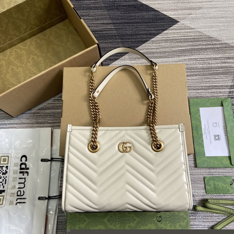 G*u*i top handle bags